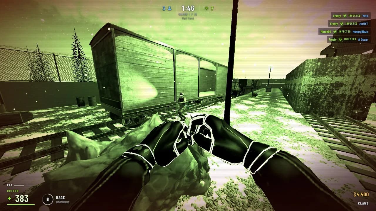 As a zombie in green night vision, chasing a human past the boxcars